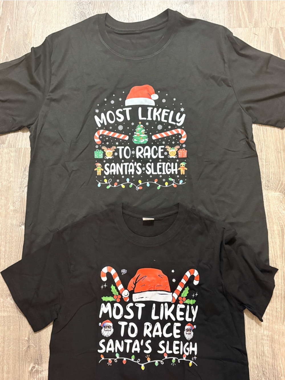 Black 'Most Likely to Race Santa's Sleigh' Holiday Tees L & XL